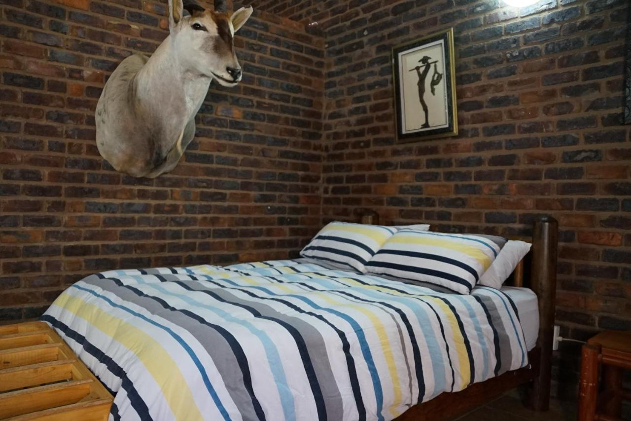 Kwele Game Lodge Beauty ภายนอก รูปภาพ